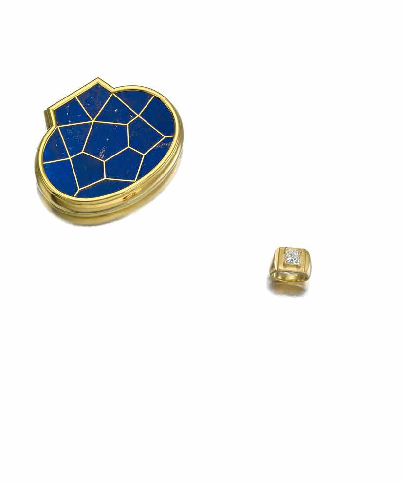97 98 97 A LAPIS LAZULI AND GOLD BOX, CARTIER, 1971 of modified oval form, the lid framed in gold with a lapis lazuli inlay; signed Cartier, Paris, with U.