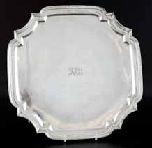 , Sheffield, 1933 1200-1800 325 325 George V silver salver with shaped rim on four scroll feet, by Harrison Brothers & Howson, Sheffield, 1932, 30oz, 933g 250-350 324 326 326 George V silver four