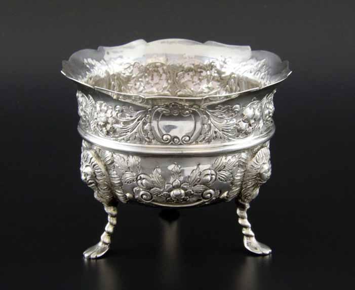 406 406 Edward VII Irish silver bowl embossed with a swan and a fox amongst foliate scrolls and fruiting vines, by Charles Lambe, Dublin, 1903, 7oz, 217g 100-150 407 Selection of George IV and
