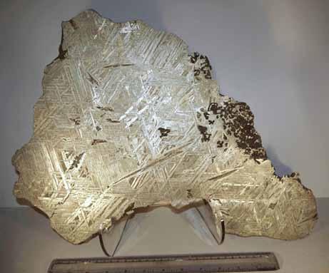 A cross section, cut, polished and etched on both sides to reveal the Widmanstatten pattern, this pattern can only be seen in iron that has an extraterrestrial origin.