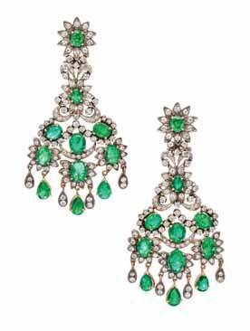 approximately 6.50 carats, six pear shape mixed cut emeralds weighing approximately 1.50 carat total, and 170 round brilliant cut diamonds weighing approximately 4.