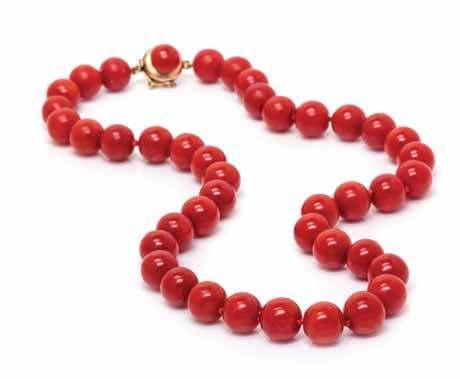 307 309 310 308 307* a Single Strand coral Bead necklace, containing 41 coral beads measuring approximately 9.51-10.