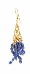 Kangles, Chicago, Illinois $3,000-5,000 361 a Yellow Gold and multi Strand Yellow Sapphire Bead torsade necklace, consisting of 14 strands containing numerous faceted yellow