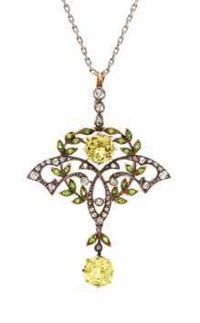 41 43 42 41* a Silver topped Gold, Yellow Sapphire, demantoid Garnet, and diamond Pendant, cooke & Kelvey, calcutta, consisting of a central garland design containing 24 round mixed cut demantoid