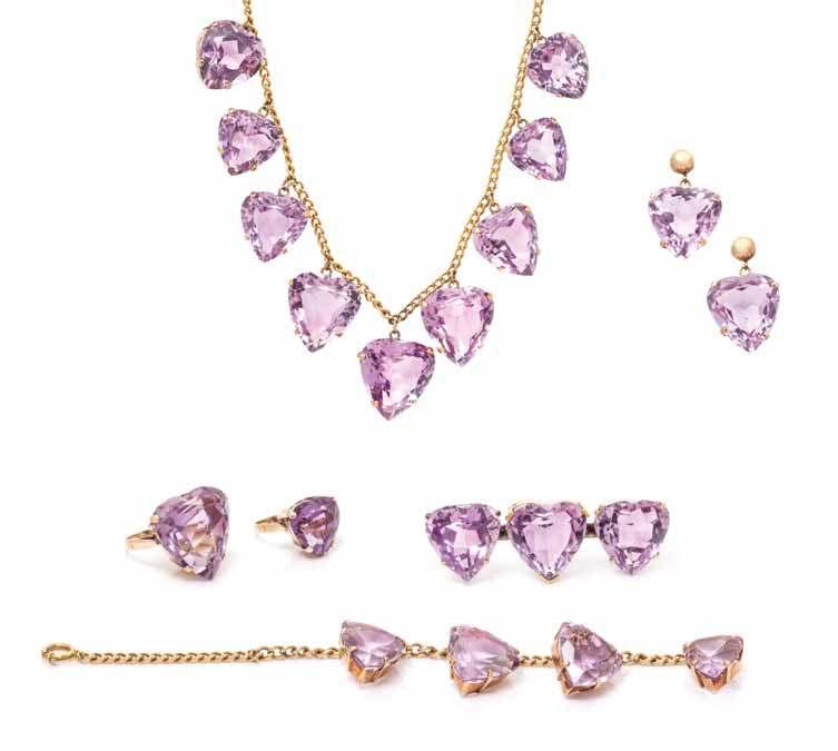 114 114 a Retro Rose Gold and amethyst Heart motif Parure, consisting of necklace containing 13 heart shape mixed cut amethysts suspended from a curb link chain, a bracelet containing four heart