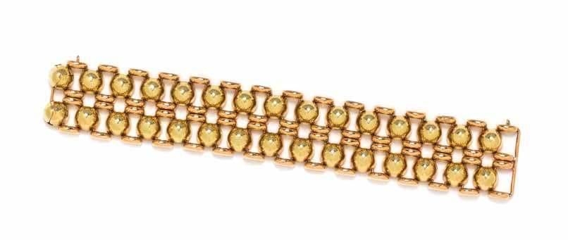 119 120 alternate view 120 118 118 a Retro 18 Karat Bicolor Gold fancy link Bracelet, consisting of a two rows of green gold high dome shaped links bordered on either side with rose gold links,