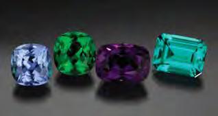 green. The center stone in the ring weighs approximately 5 ct, and the other faceted tourmalines weigh 6.73 15.77 ct; the blue teardrop in the center and the stone in the ring have been heat treated.