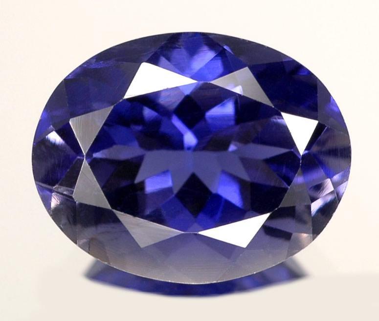 This is a Natural Gemstone 18.Iolite: Iolite is the gem-quality variety of the mineral cordierite.when transparent and of high clarity, cordierite is used as a gemstone.