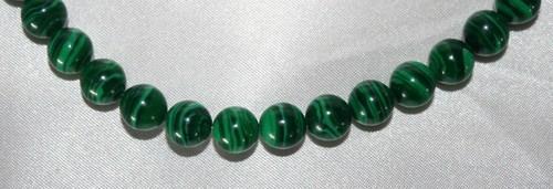 Malachite's use as gem and ornamental stone is limited by its properties.