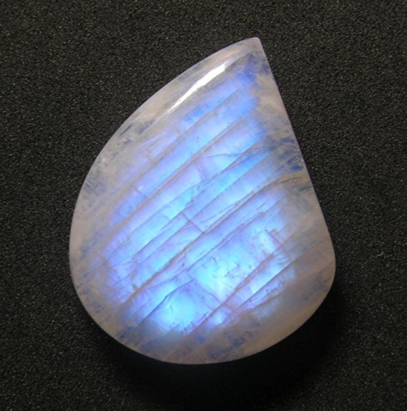 Traditionally, the classical moonstones, almost transparent and with their