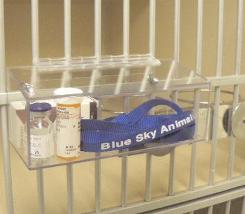 Cage Caddy It is important to keep a hospitalized patients personal items such as medications and collars close by and organized.
