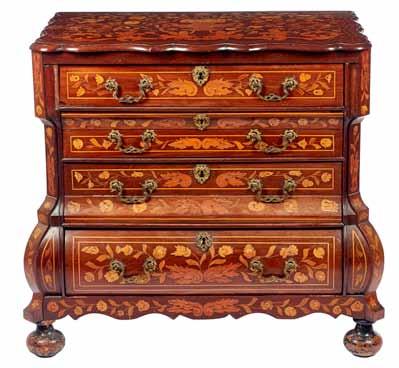 A late 19th century marquetry inlaid mahogany cylinder bureau, the galleried brass top over three short drawers and pull out fitted interior, over five further drawers, on tapering square supports,