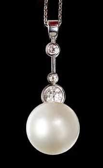 Lot 2160 Lot 2165 Lot 2170 2160. An 18ct white gold, cultured pearl and diamond pendant, mounted with the single cultured pearl at the bottom, the principle circular cut diamond (approximately 0.