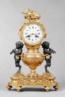 raised on four columns, each with a gilt engine-turned capital and base, on a stepped conforming plinth, on bun feet, the convex gilt dial signed LAINE A PARIS above the VI, centred with two raised