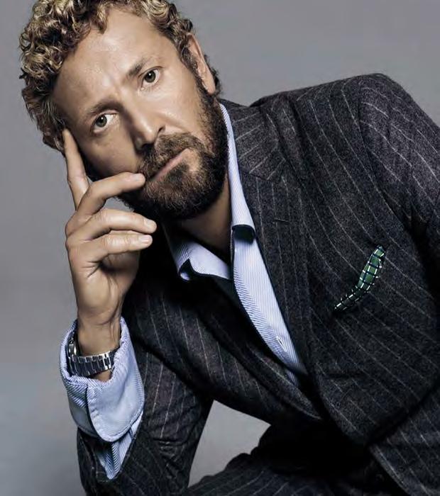 While this 49-year old Milanese born Italian may currently be plying his trade at Zegna, he is best known for the twelve years he spent at YSL, eight of which he was the Creative Director.