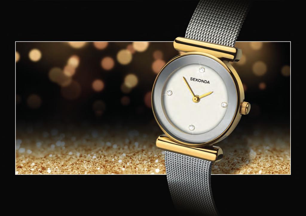 The minimalist white-tone face is set with sparkling stones, making it a perfect update for day-to-evening wear.