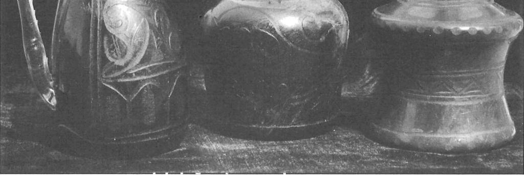 association with some of this intact glassware. Although the wickerwork remnant did not survive excavation, its presence was documented by a photograph.
