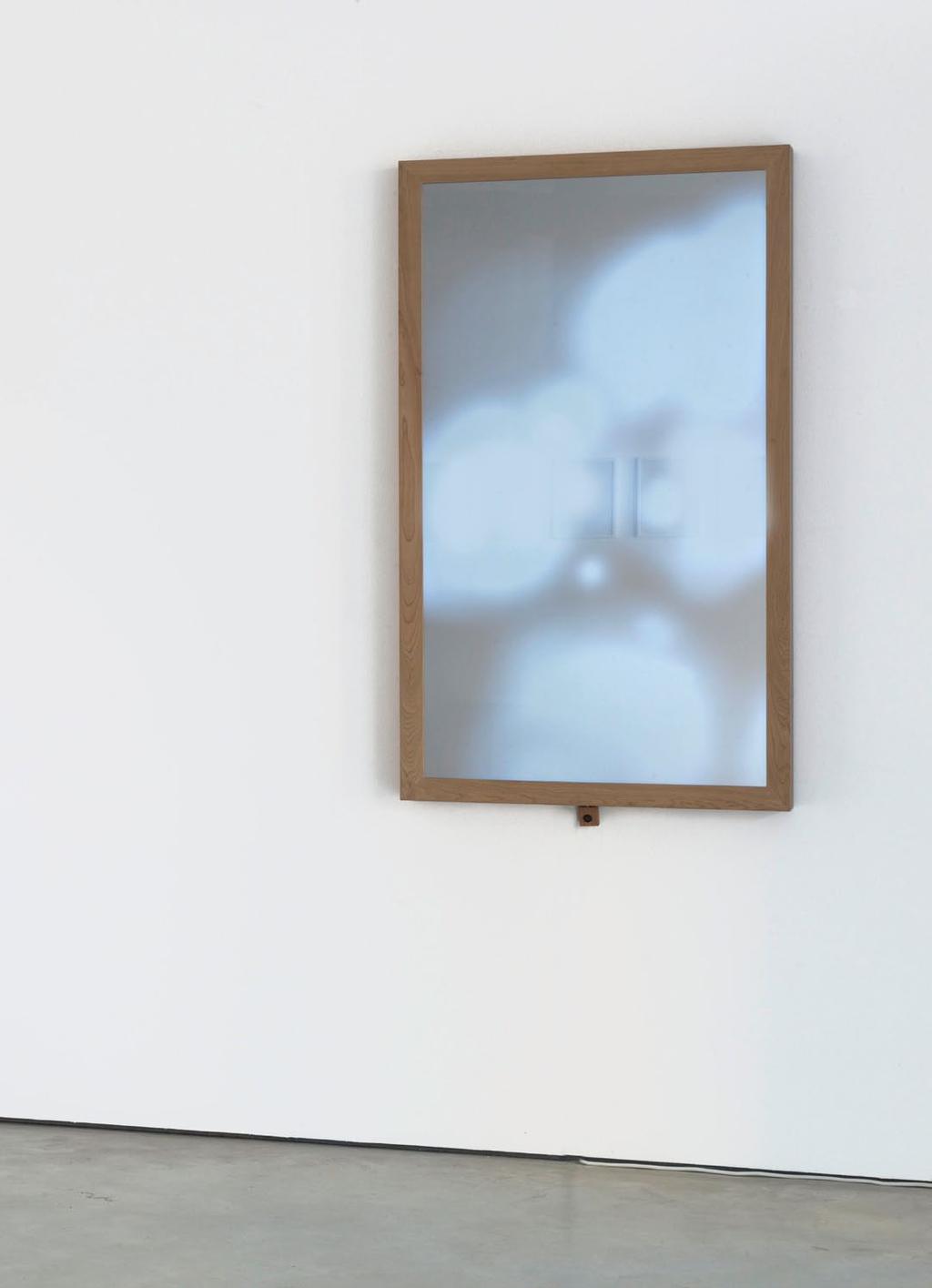 Transient Shade, 2014 Liquid cristal display, sensor, glass, mirror film, cherry wood 140 x 83 x 10cm Transient Shade seems to be a normal mirror but in fact is an apparatus that reacts with the