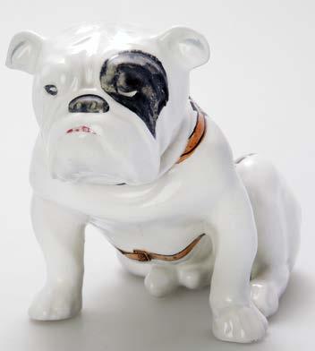 pocket and bulldogs mounted on pottery boxes.