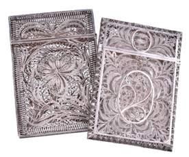 5cm (3 3/4in) long, with a suspension chain 74 Two silver filigree rectangular card cases, 1899-1908 Russian import mark, probably Indian, circa 1900, with a flower on a scroll ground,