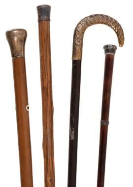 stamped 800, probably Italian, ribbed and embossed with flowers, the hardwood shaft with a steel ferrule; the others unmarked, the first 89.