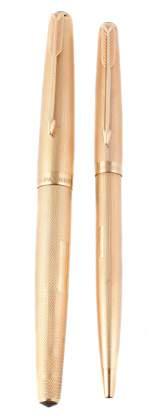 , Birmingham 1936, with a twist mechanism; and a rolled gold propelling pencil, with engine turned decoration and a rectangular shaped vacant reserve 50-80 121 Parker, an 18 carat gold fountain pen