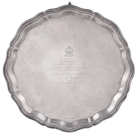 British and Foreign Silver, Electro-Plate and Allied Wares 1 [Royal, band leader and military interest] A silver shaped circular salver by Viners, Sheffield 1945, with a raised moulded rim and on
