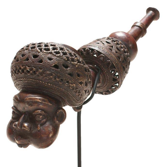 Cast bronze smoking pipe in the