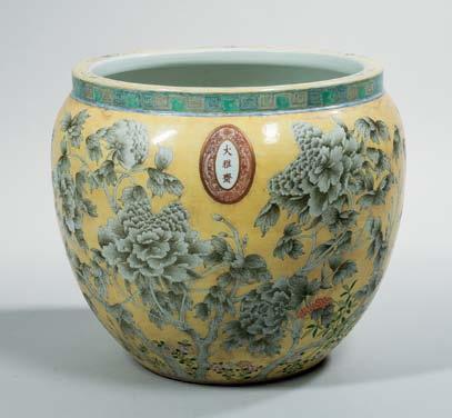 128 129 116 White-glazed Gu Vase, China, 20th century, molded floral band between two banana leaf lappets, ht. 12 3/4, mouth rim dia. 7 7/8 in.