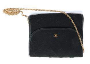193. Chanel Black Cosmetic Case, c. 1996-97, black smooth lambskin with quilted detail to base, gold tone zip, 15cm wide, 18cm high, with dust bag, grade A 150-200 194.