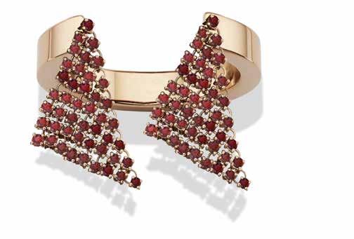 www.maisondauphin.com Fluid Fluid Captured Double Ring respectively in 18K rose gold with rubies, 18K white gold with white diamonds and 18K rose gold with brown diamonds; Fluid Captured collection.