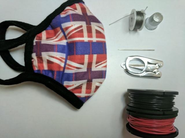 The mask will need to have several small holes cut into it so we can run the wires for