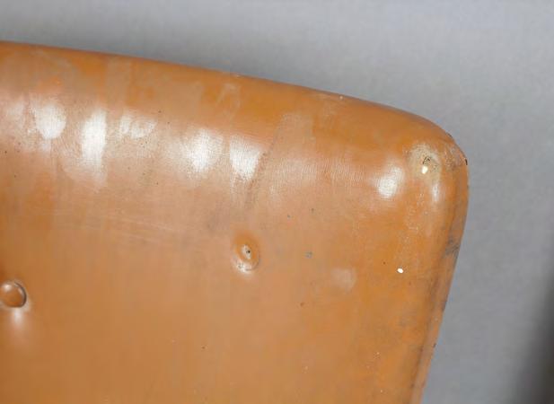Condition of the vinyl There were no signs of previous restoration or reupholstering of the chair.