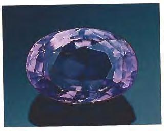 ) Flux-Grown SYNTHETIC RUBY When the staff of the New Yorlz laboratory first reported their examination of flux-grown synthetic rubies in the Spring 1965 issue of Gems &> Gemology, they undoubtedly