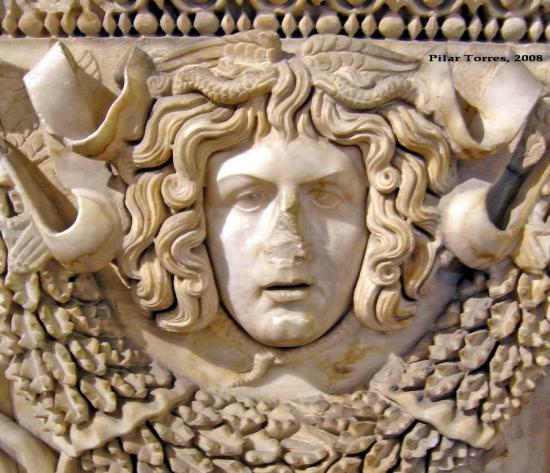 Look at the picture below Considering the interpretation of the story of Medusa, think of a reason why someone would choose this motif to decorate his/her tomb.
