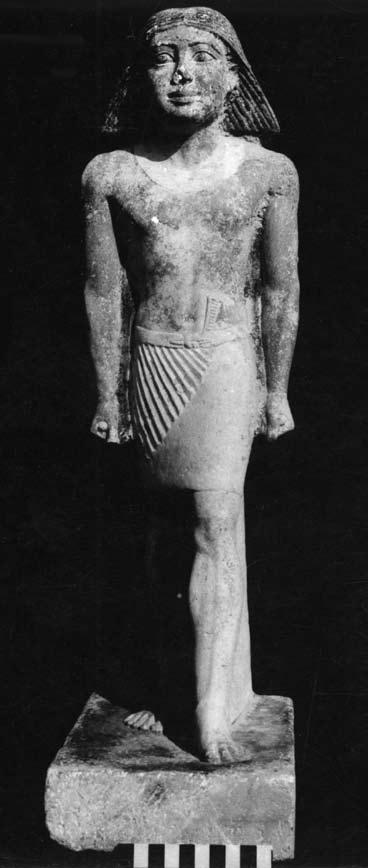 Figs. 1 2. Standing statue found near Khafre causeway. The statue is completely uninscribed. The skill of the workmanship indicates that it was fashioned by well-trained artisans.