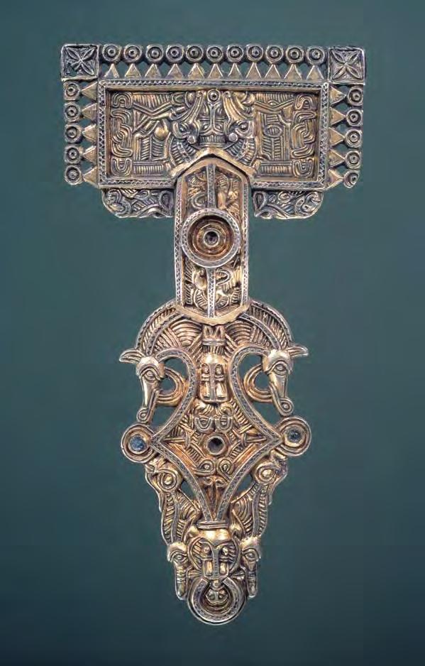 Fig. 23. The relief brooch from Vedstrup, Zealand. Photo: National Museum, Copenhagen. Length 13.9 cm.
