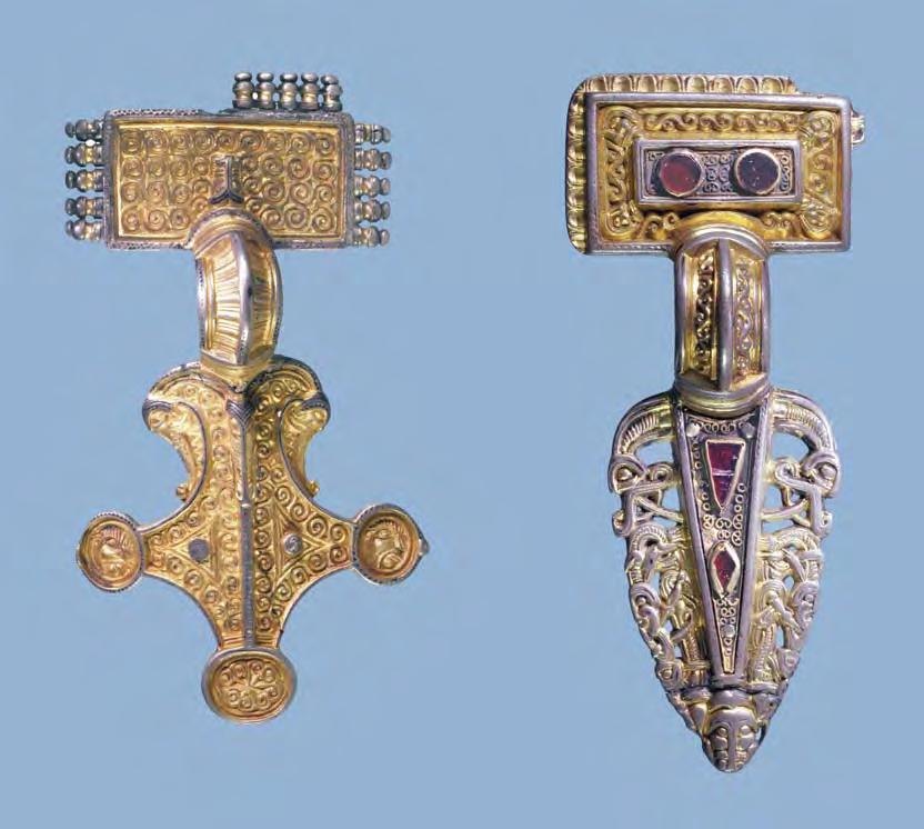 Fig. 27. Relief brooches from Grönby, Scania. Photo: Bengt Almgren, LUHM. 11 and cm. 11.8 cm. the craftsman had only one special patrix, which gave a certain width to the embossed foil band.