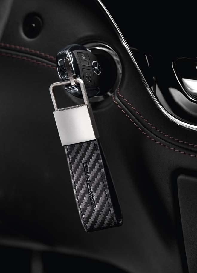 10.4 x 2.5 cm. B6 695 7777 KEY CASE Black carbon leather. Zip fastening. Zipped outside pocket.