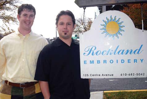Andy Shuman, right, general manager of Rockland Embroidery, along with Mike Wagaman, the company s head of sales.