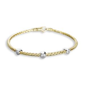 H224: Bangle Bracelet. A stylish, chic accessory, this sterling silver vermeil bracelet with 3 diamond accents (0.09ctw.) is perfect for everyday. The bracelet is 7" long and 2.5mm thick.