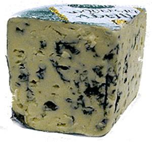 The cheese has a nutty flavour and is characterised by a skin of white, edible mould.