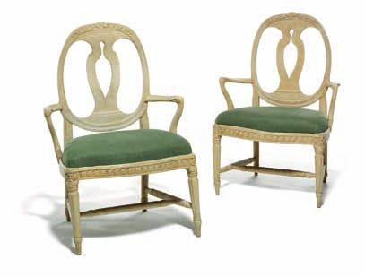 DKK 30,000 / 4,000 205 206 a pair of Gustavian grey painted armchairs with oval backs carved with flowers, round