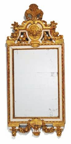 209 a Gustavian giltwood and white painted mirror, carved