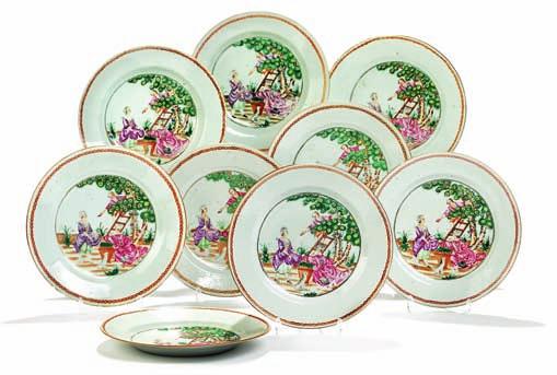 326 326 nine Chinese famille rose plates - two deep plates and seven flat, decorated in colours and gold in european style, centre with