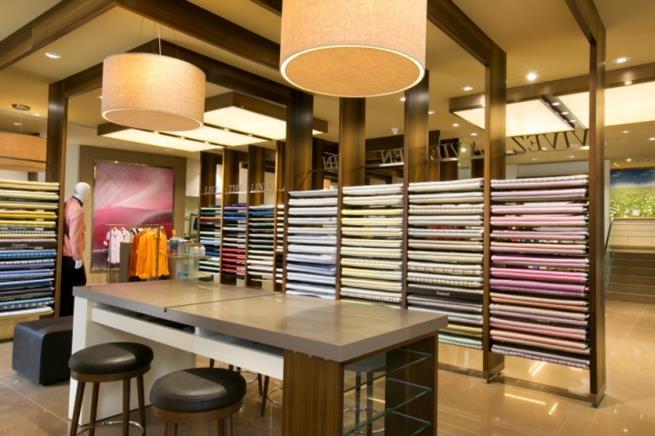 Linen Club Customer Experience - Inform A semi-private consultation area where selected product is inspected, provides a comfortable place to interact and develops a better understanding