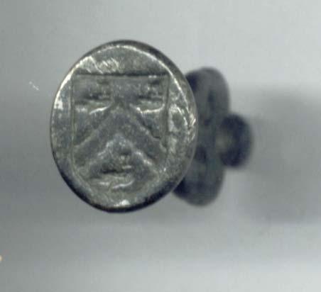 Item Number: 4 Hewit Family Shield Silver seal matrix with ornamental top. 1.