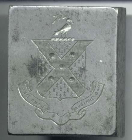 Item Number: 8 Manders Family Crest steel engraved block with short handle; approximately 1.