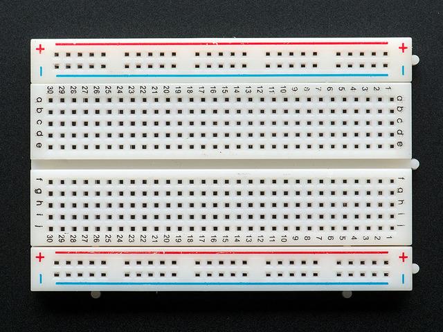 Learn More Breadboard from Wikipedia (http://adafru.it/dxj) A breadboard (or protoboard) is usually a construction base for prototyping of electronics.