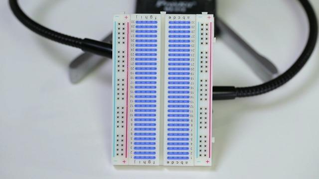 When we place a component on a breadboard, we re essentially wiring it into one of those internally connected rows.